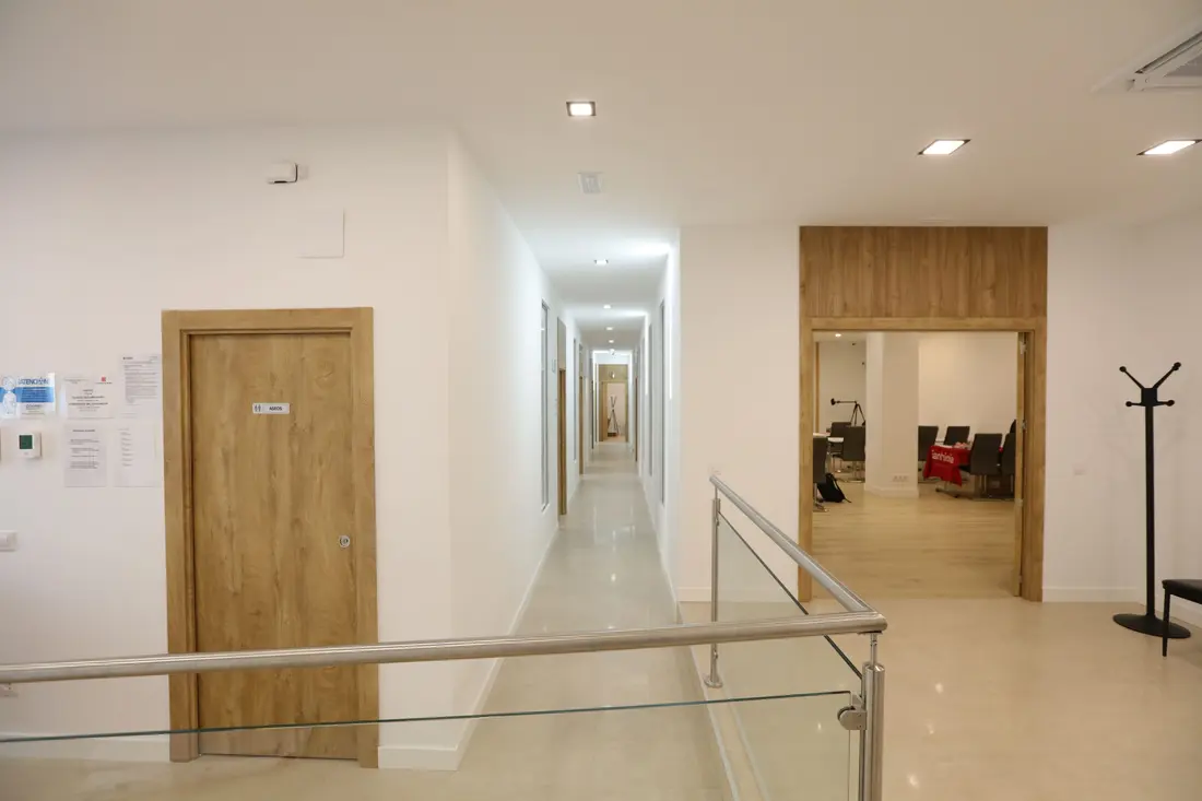 The corridor leading to the clinical boxes, with its wooden doors